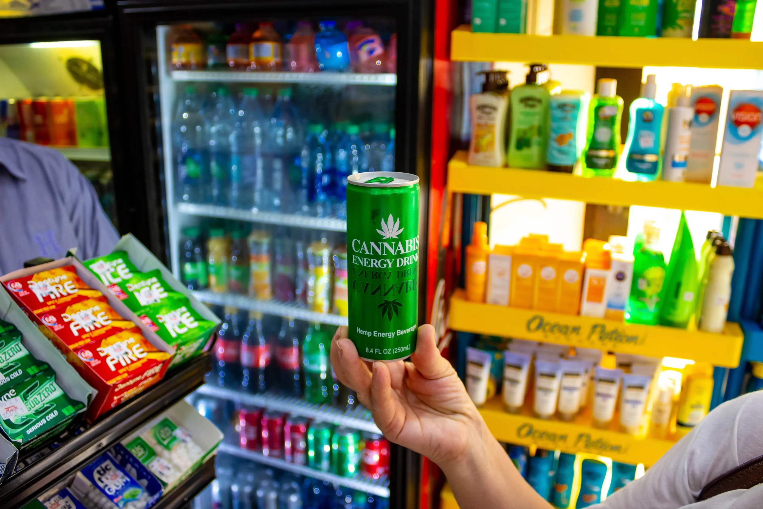 Cannabis Beverages Near Me - Your Guide to Getting Legally Lit (in Liquid Form) Cannabis Beverages Near Me - Picture of THC Drink in a hand in a store